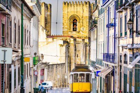 Tram and historical monument in Lisbon, Portugal