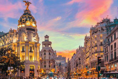 Madrid city skyline gran via street twilight , Spain